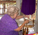 Joy with her spinning wheel.